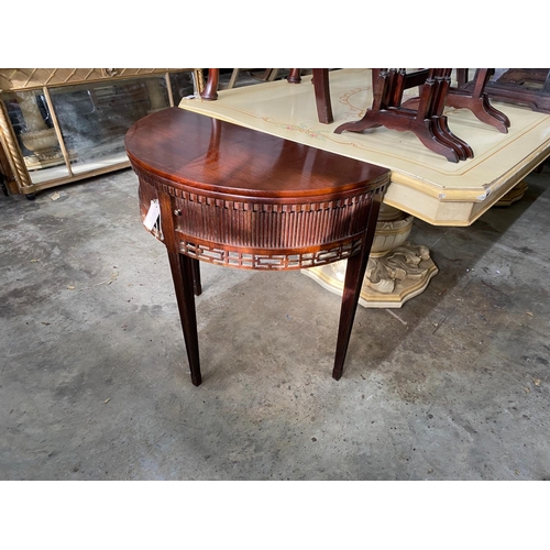 1151 - A reproduction George III style mahogany demi lune folding tea table, width 77cm, depth 38cm, height... 