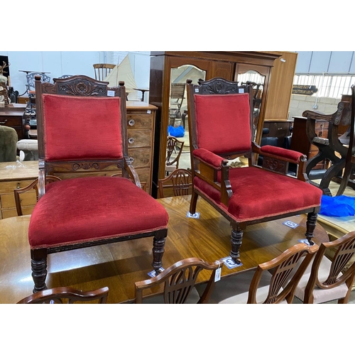 1164 - A pair of late Victorian carved mahogany upholstered salon chairs, one with arms, width 70cm, depth ... 