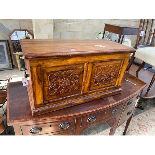 1168 - A modern carved hardwood trunk, length 80cm, depth 40cm, height 43cm