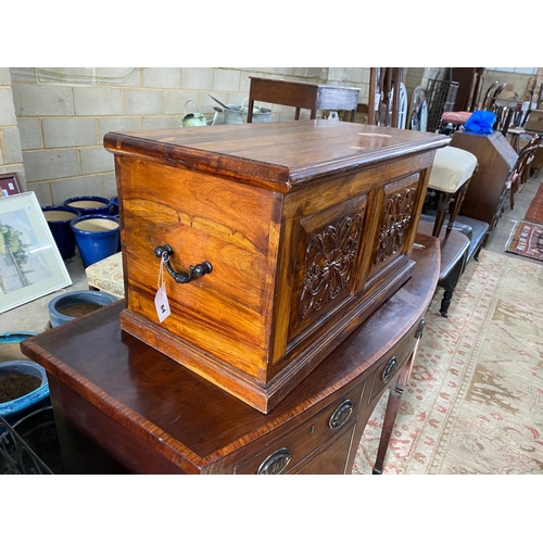 1168 - A modern carved hardwood trunk, length 80cm, depth 40cm, height 43cm