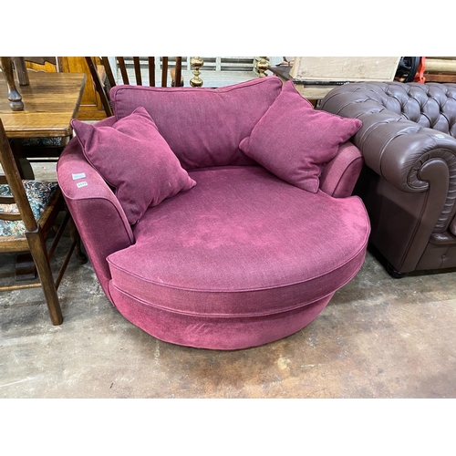 1177 - A Heals Bella 'twister' armchair, width 128cm, height 65cm