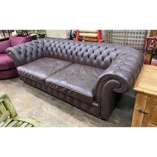 1178 - A Heals buttoned brown leather Chesterfield settee, length 234cm, depth 100cm, height 76cm