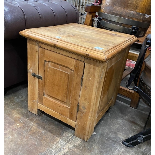 1179 - A Victorian stripped pine bedside cupboard, width 60cm, depth 61cm, height 63cm