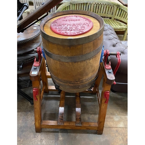 1185 - An early 20th century iron bound coopered oak butter churn, by Hathaway of the Chippenham Cheese Fac... 