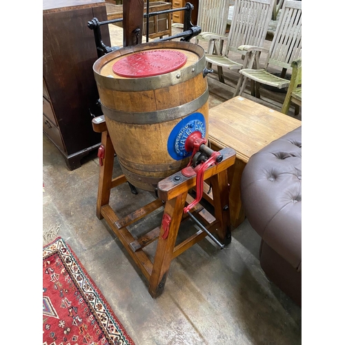 1185 - An early 20th century iron bound coopered oak butter churn, by Hathaway of the Chippenham Cheese Fac... 