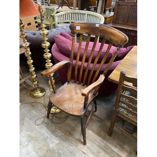 1189 - A Victorian elm and beech kitchen lathe back armchair, width 51cm, depth 44cm, height 112cm