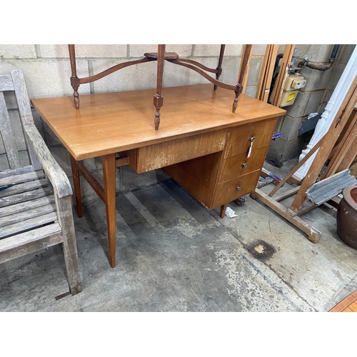 1191 - A mid century teak kneehole desk, length 121cm, depth 60cm, height 76cm