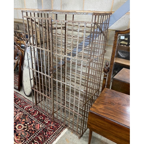 1203 - A vintage French wrought iron wine cage, width 102cm, depth 56cm, height 164cm