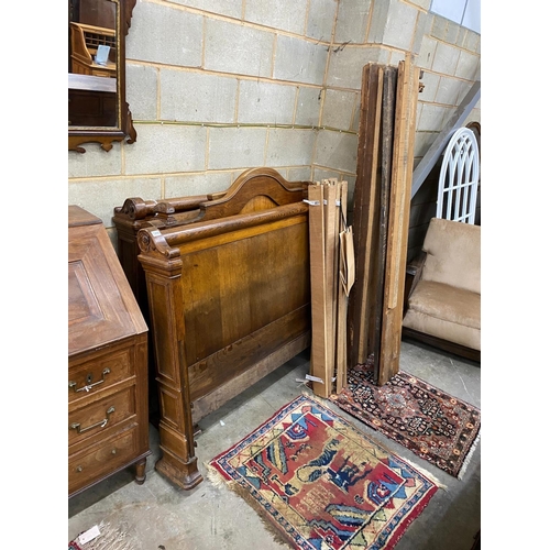 1205 - Two 19th century oak and walnut bed frames, larger width 127cm