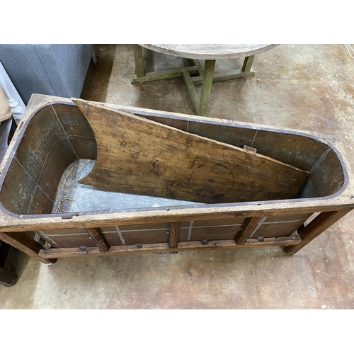 1208 - A 19th century French oak bath with zinc liner and cover, length 142cm, depth 65cm, height 64cm... 