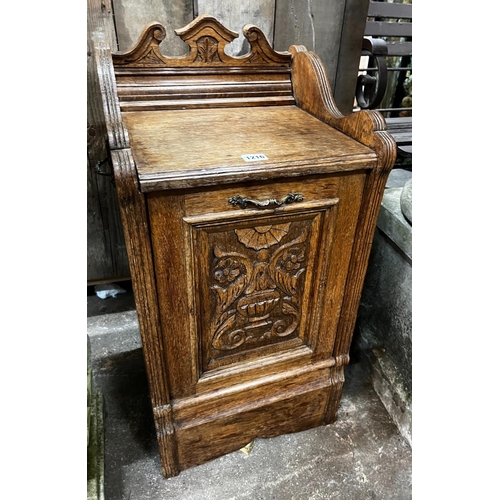 1216 - A Victorian carved oak coal purdonium, width 38cm, depth 35cm, height 75cm