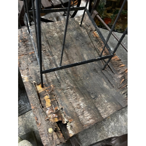 1219 - A wrought iron garden growing frame, height 130cm together with three wrought iron folding garden ch... 