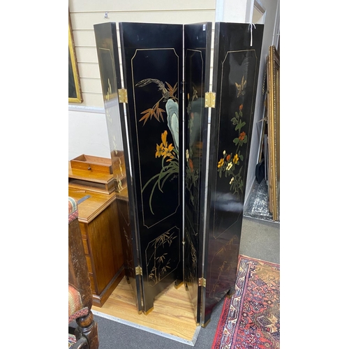 1224 - A Chinese lacquer four fold dressing screen, each panel width 40cm, height 184cm