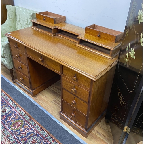 1224A - A Victorian mahogany kneehole dressing table, width 126cm, depth 58cm, height 86cm