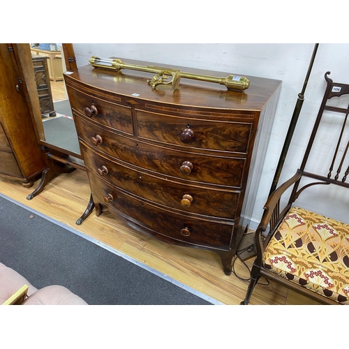 1227 - An early Victorian mahogany bowfront chest of two short and three long drawers, width 95cm, depth 51... 