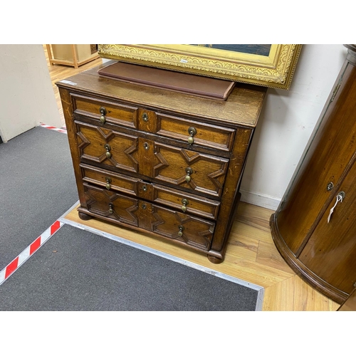 1229 - A 17th century oak geometric chest, width 87cm, depth 54cm, height 80cm