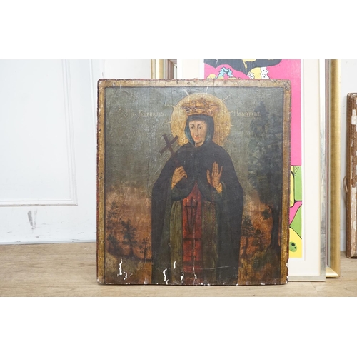 1717 - 19th century Russian School, tempera on panel, Icon of a female saint, 62 x 58cm