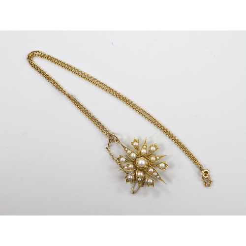 1962 - An Edwardian yellow metal and split pearl cluster set starburst pendant  brooch, 37mm, on a later 9c... 