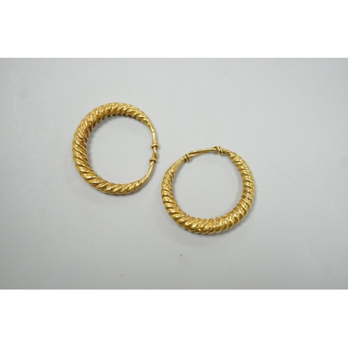 1964 - A pair of possibly Roman? yellow metal spiral twist loop earrings, 30mm, 8 grams.