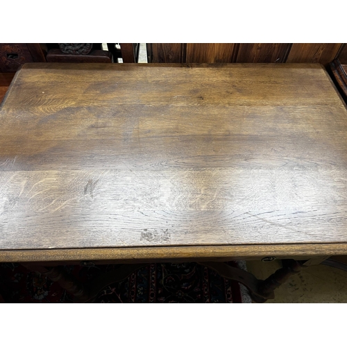 105 - A small 1920's oak side table, width 84cm, depth 52cm, height 75cm