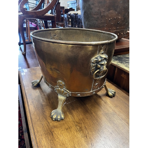 106 - An oval brass Dutch style coal bin, width 41cm, depth 36cm, height 31cm