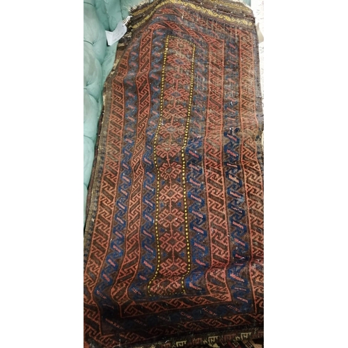 129 - Six antique Belouch bags and faces, largest 200 x 52cm