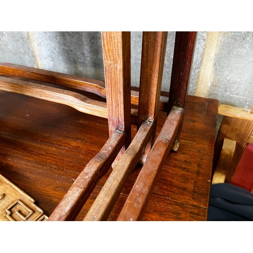 173 - A nest of three Chinese rectangular hardwood tea tables, width 49cm, depth 35cm, height 59cm