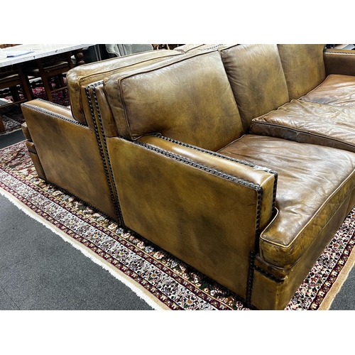 186 - A pair of brown leather brass studded three seater settees, length 200cm, depth 90cm, height 84cm... 