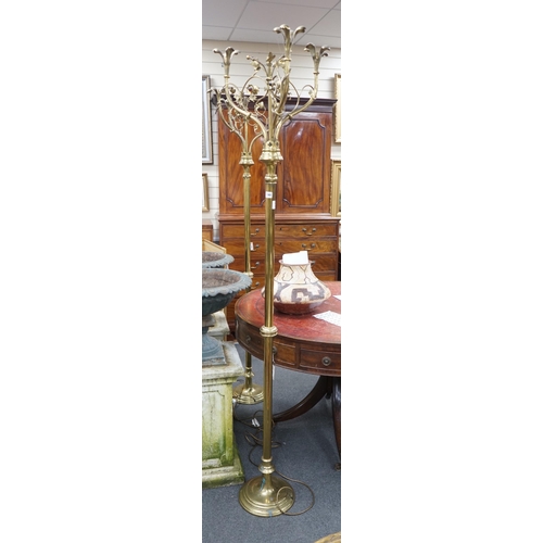 190 - A pair of Victorian Gothic brass ecclesiastical three branch floor lamps, converted to electricity, ... 