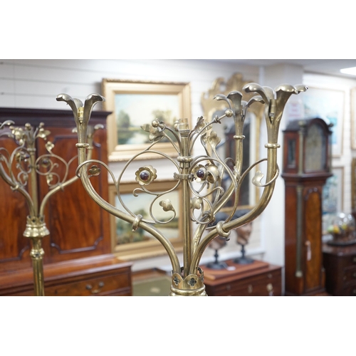 190 - A pair of Victorian Gothic brass ecclesiastical three branch floor lamps, converted to electricity, ... 