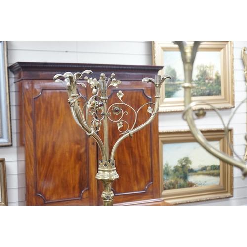 190 - A pair of Victorian Gothic brass ecclesiastical three branch floor lamps, converted to electricity, ... 