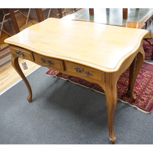 199 - An early 20th century French serpentine three drawer side table, width 108cm, depth 62cm, height 76c... 