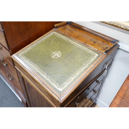 211 - An early Victorian rosewood Davenport, with sliding top, width 50cm, depth 58cm, height 89cm