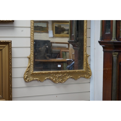 225 - A George II style carved giltwood and composition wall mirror, width 76cm, height 135cm