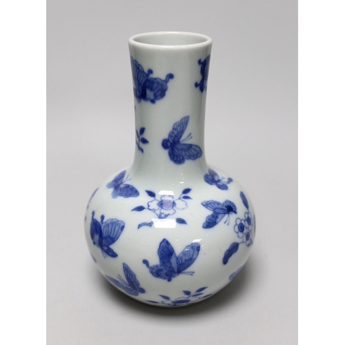 251 - A Chinese blue and white butterfly vase, 19cm