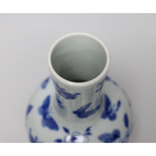 251 - A Chinese blue and white butterfly vase, 19cm