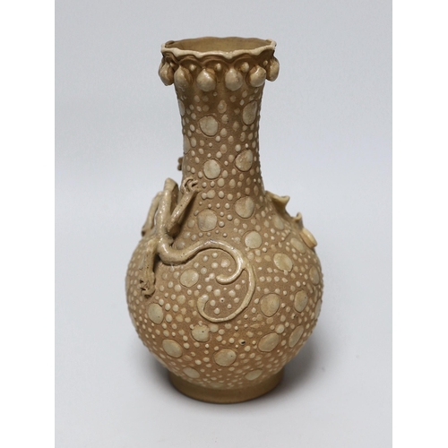 255 - A Chinese enamelled biscuit porcelain 'chilong' vase, 21cm