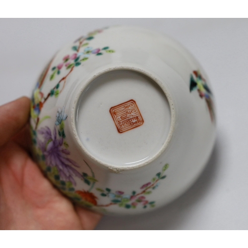 257 - A Chinese blue and white saucer, together with a dragon and phoenix saucer and a famille rose bowl... 