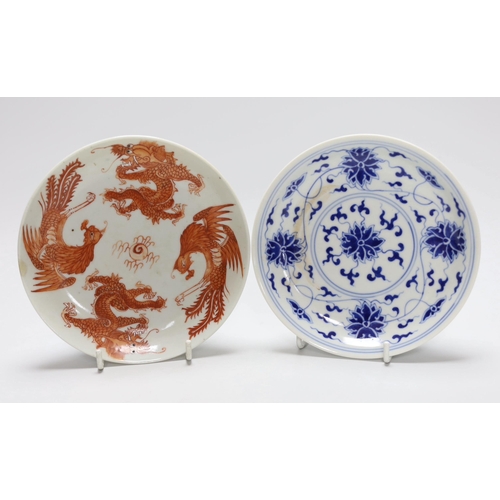 257 - A Chinese blue and white saucer, together with a dragon and phoenix saucer and a famille rose bowl... 