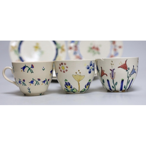 259 - Jessie Marion King (1875-1949), four various floral design tea plates and three tea cups