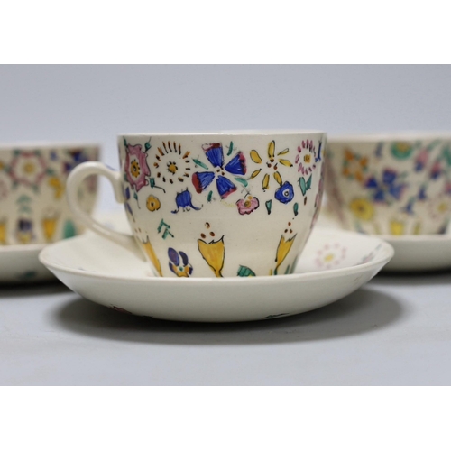 267 - Jessie Marion King. A set of six floral teacups and saucers