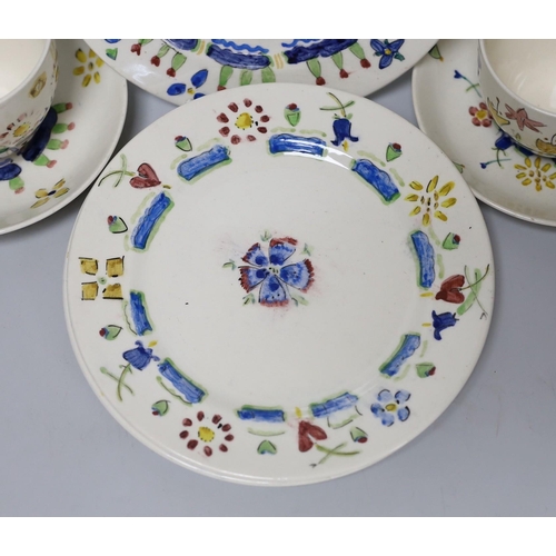 269 - Jessie Marion King (1875-1949). Three different floral design tea cups, saucers and plates