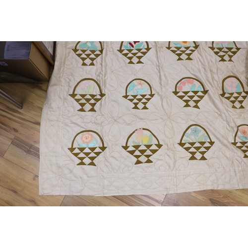 272 - A North American embroidered silk quilt