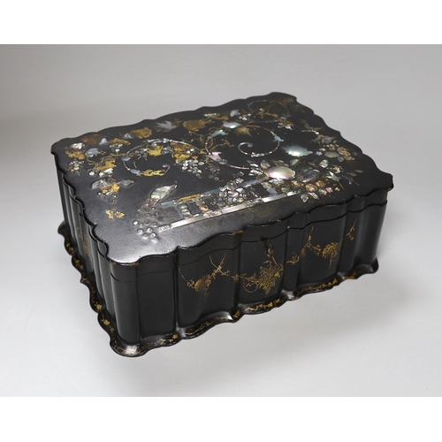 273 - A Victorian papier mache workbox and contents, 32cm