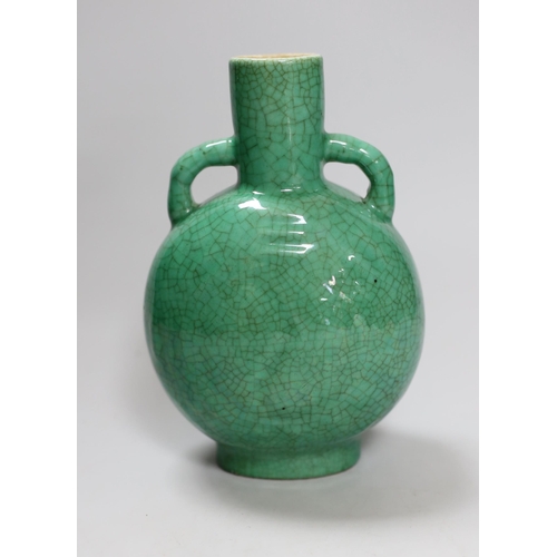 282 - A 19th century Chinese green crackle glaze eight trigrams moonflask, 19.5cm