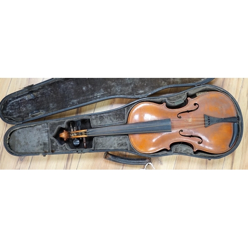 293 - An early 20th century Stainer violin, patent number 23140, back measures 36.5cm excl button. cased.... 