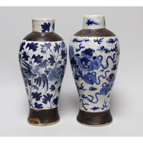 296 - A pair of 19th century Chinese crackleglaze blue and white vases, 27cm