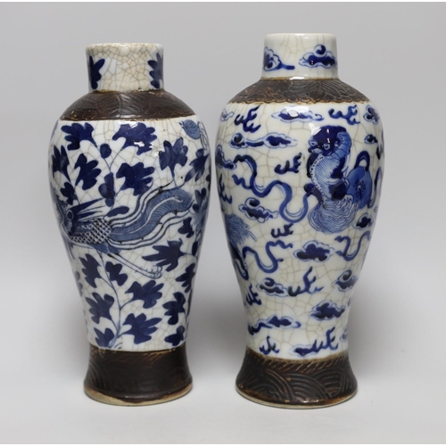 296 - A pair of 19th century Chinese crackleglaze blue and white vases, 27cm