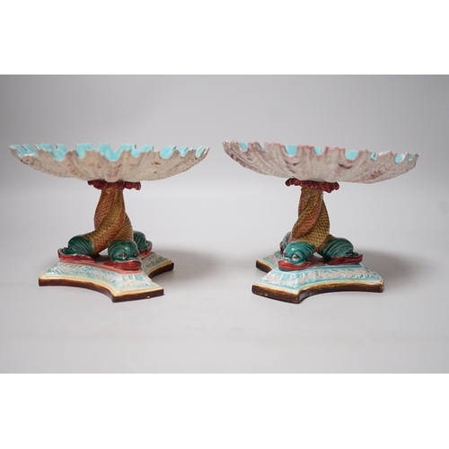 305 - A pair of late 19th century Royal Worcester majolica dolphin comports, 10cm tall