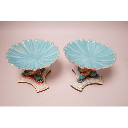 305 - A pair of late 19th century Royal Worcester majolica dolphin comports, 10cm tall